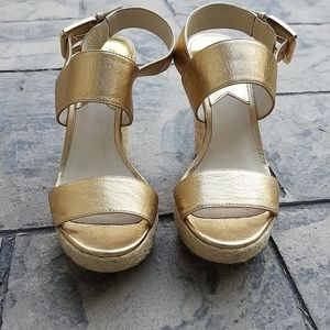 Michael Kors gold wedges